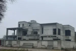 Under-construction residential building showcasing structural work and project development